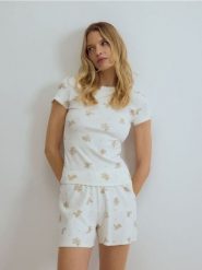 Dwuczęściowa piżama z bawełną - złamana biel. Piżamy damskie Reserved, bez wzorów, z bawełny, bez ramiączek. Za 89.99 zł.