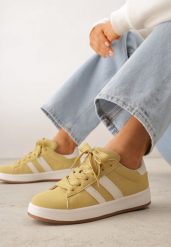 Żółte Sneakersy z Ozdobnymi Paskami Doloreth. Żółte obuwie sportowe damskie Born2be, z jeansu, bez zapięcia. Za 89.99 zł.