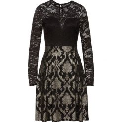 Sukienka z koronką bonprix czarny. Czarne sukienki damskie bonprix, w koronkowe wzory, z koronki. Za 124.99 zł.