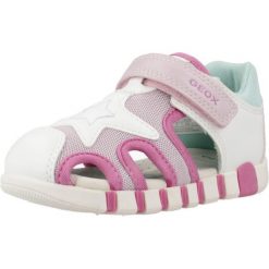 Sandały Geox Model B Sandal Iupidoo Gir Kolor Biały. Białe sandały damskie Geox, bez wzorów, z syntetyku, bez obcasa, bez zapięcia. Za 189.99 zł.