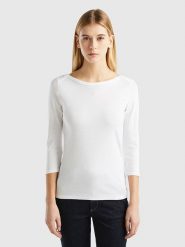 Benetton Koszulka w kolorze białym rozmiar: XL. Białe bluzki damskie Benetton, xl, bez wzorów, z bawełny, bez kołnierzyka, bez ramiączek. Za 52.67 zł.