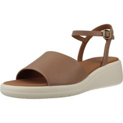 Sandały GEOX D MELICONIA Brązowy. Brązowe sandały damskie Geox, bez wzorów, z syntetyku, bez obcasa, bez zapięcia. Za 332.99 zł.