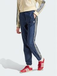 Adidas Spodnie dresowe Pinstripe Firebird Track Pant KR7037 Granatowy Regular Fit. Niebieskie spodnie dresowe damskie Adidas, xs, bez wzorów, z dresówki. Za 399.99 zł.