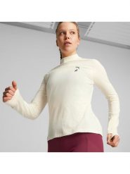 Puma Koszulka funkcyjna "Seasons" w kolorze kremowym rozmiar: M. Brązowe koszulki damskie Puma, m, bez wzorów, bez kołnierzyka, bez ramiączek. Za 136.78 zł.