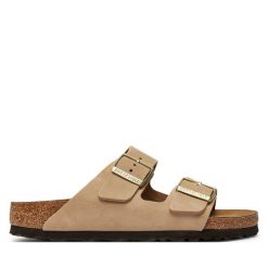 Klapki Birkenstock. Brązowe klapki damskie Birkenstock, bez wzorów, bez obcasa, bez zapięcia. Za 579.99 zł.