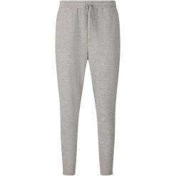 Damskie spodnie dresowe Athlecia Jacey V2. Szare spodnie sportowe damskie Athlecia, bez wzorów, z dresówki, do biegania. Za 249.00 zł.
