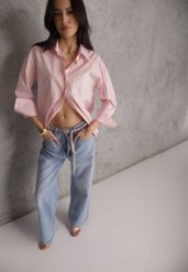 Niebieskie Jeansy Szerokie z Bawełną High Waist Ozdobione Wiązanym Sznurkiem Neviolla. Niebieskie jeansy damskie Renee, z podwyższonym stanem. Za 119.99 zł.