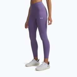 Legginsy treningowe damskie Under Armour Motion Ankle. Fioletowe obuwie sportowe damskie Under Armour, bez zapięcia, na fitness i siłownię. Za 129.99 zł.