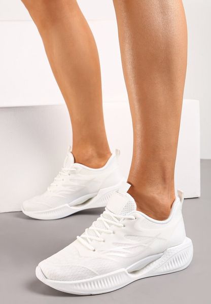 Białe Sznurowane Buty Sportowe na Piankowej Podeszwie z Ozdobnym Detalem Atnarama. Białe obuwie sportowe casual damskie Born2be, bez zapięcia. Za 99.99 zł.