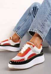 Biało-Pomarańczowe Sneakersy na Platformie Ozdobione Nitami i Patchworkowymi Wstawkami Jeneria. Białe obuwie sportowe damskie Renee, bez zapięcia. Za 74.99 zł.