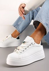 Biało-Czarne Sneakersy na Platformie z Biżuteryjnymi Zawieszkami na Sznurówkach Faeleen. Białe obuwie sportowe damskie Renee, bez zapięcia. Za 99.99 zł.