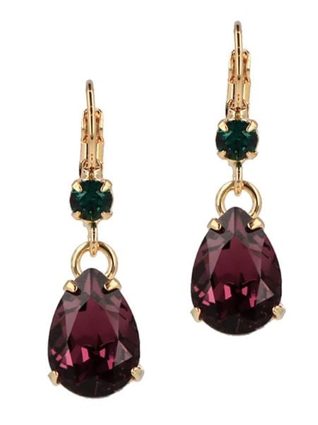 Otazu Pozłacane kolczyki z kryształami Swarovski rozmiar: onesize. Fioletowe kolczyki damskie Otazu, z kryształem, pozłacane. Za 113.99 zł.