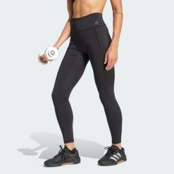 Legginsy treningowe Optime Workout Full Length. Czarne legginsy damskie Adidas, bez wzorów, ze skóry. Za 259.00 zł.
