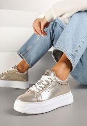 Złote Sneakersy Vices na Platformie Ozdobione Napisem i Perforacją Nonaritha. Żółte obuwie sportowe damskie Renee, z jeansu, bez zapięcia. Za 99.99 zł.