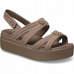 Sandały Dla Dorosłych Crocs Brooklyn Knot Low Wedge Sandal. Brązowe sandały damskie Crocs, bez wzorów, z materiału, bez obcasa, na koturnie, bez zapięcia. Za 289.99 zł.