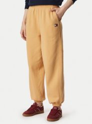 Tommy Jeans Spodnie dresowe Badge DW0DW23536 Beżowy Regular Fit. Brązowe spodnie dresowe damskie Tommy Jeans, s, bez wzorów, z bawełny. Za 329.99 zł.