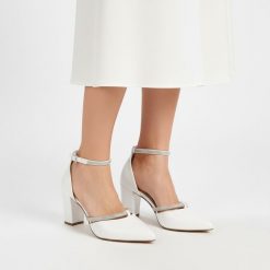 Czółenka damskie Marco Tozzi, ze skóry naturalnej na stabilnym słupku zapewniającym wygodę z paskiem wokół kostki poprawiającym dopasowanie i stabiln. Białe czółenka damskie Marco Tozzi, bez wzorów, ze skóry, bez obcasa, na słupku. Za 279.00 zł.