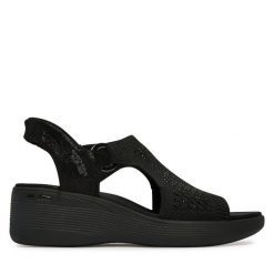 Sandały Skechers. Czarne sandały damskie Skechers, bez wzorów, bez obcasa, na koturnie, bez zapięcia. Za 359.99 zł.