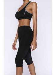 Onamaste Legginsy sportowe w kolorze czarnym rozmiar: S/M. Czarne legginsy damskie Onamaste, m, bez wzorów, z materiału. Za 100.99 zł.