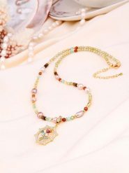 L'Atelier de Gaia Pozłacany naszyjnik z elementami ozdobnymi - dł. 50 cm rozmiar: onesize. Czerwone naszyjniki damskie L'Atelier de Gaia, z cyrkonią, pozłacane. Za 144.92 zł.