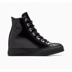 Damskie skórzane buty sportowe Converse Chuck Taylor All Star Platform. Czarne obuwie sportowe casual damskie Converse, bez zapięcia. Za 459.50 zł.
