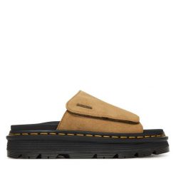 Klapki Dr. Martens. Brązowe klapki damskie Dr Martens, bez wzorów, bez obcasa, bez zapięcia. Za 543.99 zł.