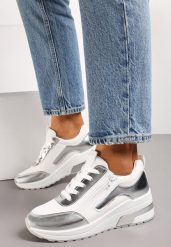 Biało-Srebrne Sneakersy z Ekoskóry z Połyskującymi Detalami i Ozdobnym Zamkiem Raviles. Białe obuwie sportowe damskie Renee, bez zapięcia. Za 109.99 zł.