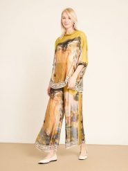 BGN Spodnie w kolorze pomarańczowo-żółtym rozmiar: 40. Żółte spodnie materiałowe damskie BGN, bez wzorów, z materiału. Za 195.99 zł.