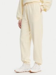 Reebok Spodnie dresowe RK25529CCW Żółty Regular Fit. Żółte spodnie dresowe damskie Reebok, m, bez wzorów, z bawełny. Za 199.99 zł.