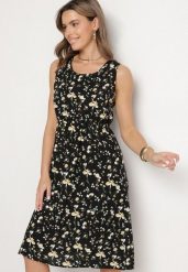 Czarna Rozkloszowana Sukienka w Kwiatowy Wzór Falsedi. Czarne sukienki damskie Born2be, bez wzorów, eleganckie, bez ramiączek. Za 69.99 zł.
