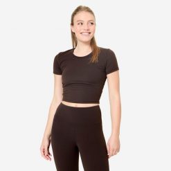 Koszulka do jogi i pilatesu Breathe. Zielone bluzki damskie DOMYOS, l, bez wzorów, z elastanu, bez kołnierzyka, bez ramiączek. Za 64.99 zł.