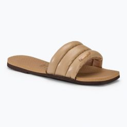 Klapki damskie Havaianas You Milan. Brązowe klapki damskie Havaianas, bez wzorów, z materiału, bez obcasa, bez zapięcia. Za 119.99 zł.