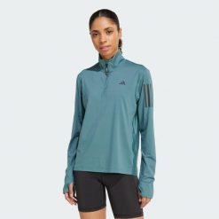 Kurtka Own the Run Half-Zip. Niebieskie kurtki damskie Adidas, xs, bez wzorów, z materiału, bez kaptura. W wyprzedaży za 164.25 zł.
