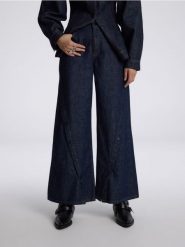 Jeansy wide leg z rozpiananymi nogawkami - granatowy. Niebieskie jeansy damskie Reserved. W wyprzedaży za 129.99 zł.
