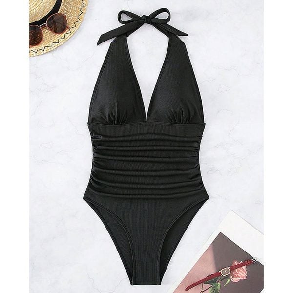 Kostium kąpielowy zakładany na szyję na plażę i basen Georgann. Zielone stroje jednoczęściowe Intica, bez wzorów, z materiału. W wyprzedaży za 129.00 zł.