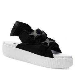 Sandały Puma. Czarne sandały damskie Puma, bez wzorów, bez obcasa, na koturnie, bez zapięcia. Za 229.99 zł.