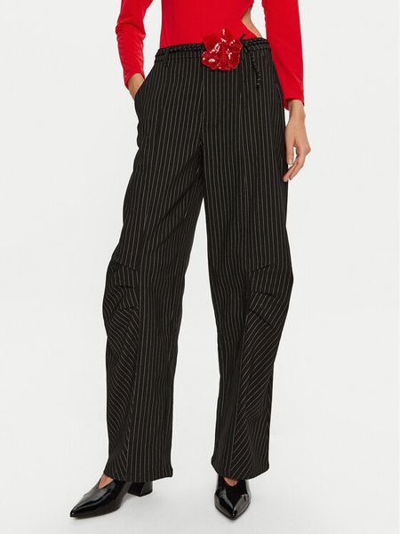 ROTATE Spodnie materiałowe Cassandria 1131372470 Czarny Loose Fit. Czarne spodnie materiałowe damskie ROTATE, bez wzorów, z materiału. Za 839.00 zł.