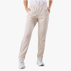 Spodnie treningowe damskie Swedemount Training Logo Pants II. Brązowe obuwie sportowe damskie SWEDEMOUNT, bez wzorów, z dresówki. Za 199.99 zł.