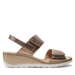 Sandały Caprice. Żółte sandały damskie Caprice, bez wzorów, bez obcasa, na koturnie, bez zapięcia. Za 189.99 zł.
