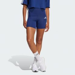 Szorty Essentials 3-Stripes High Waisted Biker. Białe spodenki sportowe damskie Adidas, uniwersalny, bez wzorów, z bawełny, na fitness i siłownię. Za 109.00 zł.