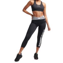 Biustonosz sportowy damski Superdry Core Mid Impact. Białe biustonosze sportowe damskie Superdry, bez wzorów, z elastanu. Za 102.00 zł.