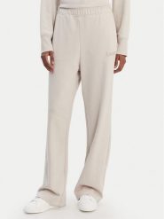 DKNY Sport Spodnie dresowe DP6P3795 Beżowy Regular Fit. Brązowe spodnie dresowe damskie DKNY Sport, l, bez wzorów, z bawełny. Za 309.99 zł.