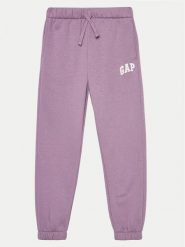Gap Spodnie dresowe 645535-02 Fioletowy Relaxed Fit. Fioletowe spodnie dresowe dziewczęce GAP, bez wzorów, z bawełny. Za 99.99 zł.