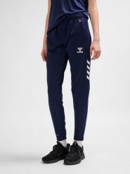Damskie spodnie dresowe Hummel Core XK. Niebieskie spodnie sportowe damskie Hummel, na jesień, l, bez wzorów, z dresówki, z standardowym stanem, do biegania. Za 190.00 zł.