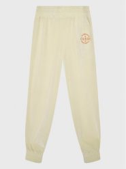 Guess Spodnie dresowe J2BQ12 KBEB0 Beżowy Regular Fit. Brązowe spodnie dresowe dziewczęce Guess, z aplikacjami, z dresówki. Za 239.99 zł.