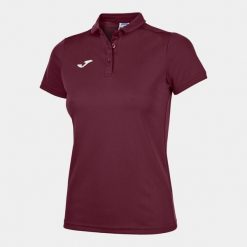 Koszulka polo do tenisa damska Joma Hobby. Brązowe bluzki damskie Joma, l, bez wzorów, sportowe, bez kołnierzyka, bez ramiączek. Za 230.50 zł.