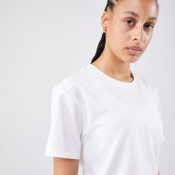 Koszulka tenisowa krótki rękaw damska Artengo Crop Top DRY. Białe bluzki damskie ARTENGO, xl, bez wzorów, z elastanu, bez kołnierzyka, bez ramiączek. W wyprzedaży za 69.99 zł.