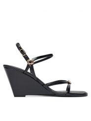 Guess Sandały FLTDVV PAF04 Czarny. Czarne sandały damskie Guess, z aplikacjami, ze skóry, bez obcasa, na koturnie, bez zapięcia. Za 494.99 zł.