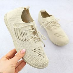 Buty sportowe damskie ażurowe beżowe News 1020. Brązowe obuwie sportowe casual damskie NEWS, z tkaniny. Za 49.50 zł.