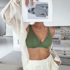 Biustonosz z fiszbinami zapewniający wsparcie i komfort Fjorda. Żółte biustonosze Intica, bez wzorów. Za 139.00 zł.